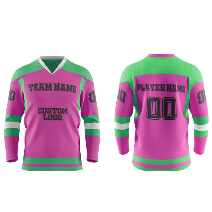 Pink and green sports jersey with customizable text on a white background