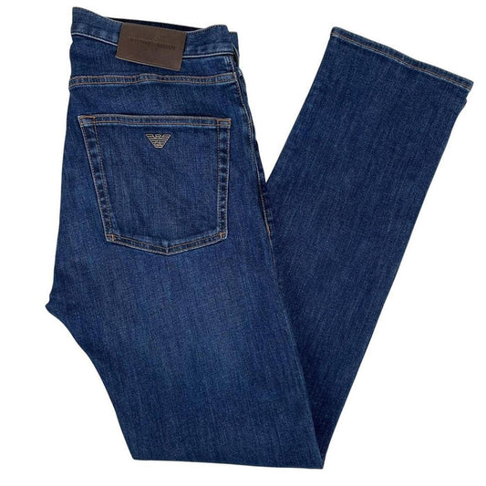 Emporio Armani navy blue slim fit denim jeans with logo patch and classic five-pocket design.