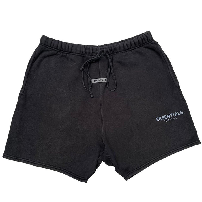 Essentials black jogger shorts cotton material with faded detailing and logo.