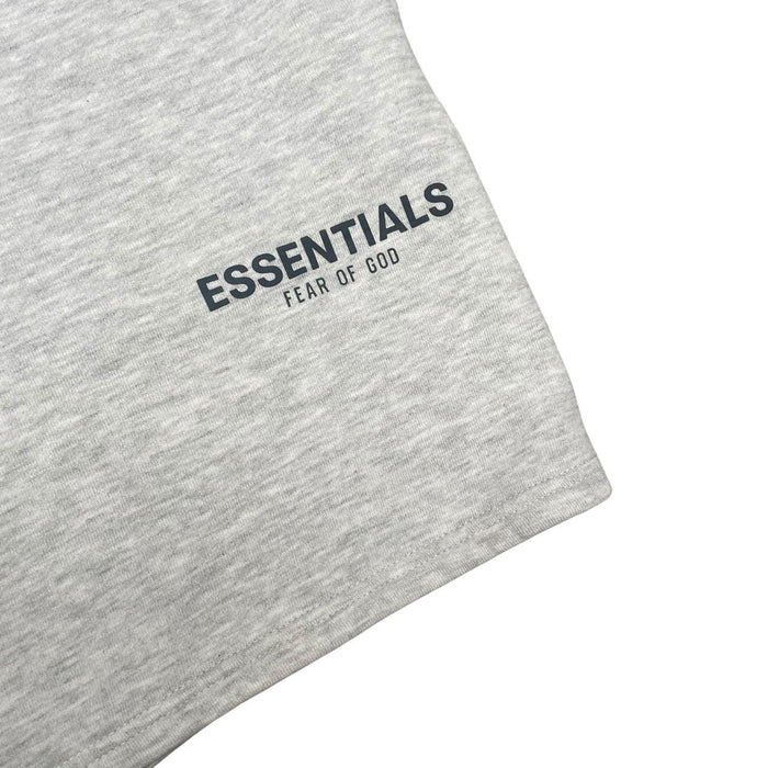 Essentials grey jogger shorts cotton material with logo detail and relaxed fit.