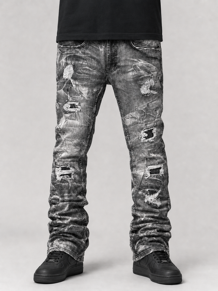 Evolution Explosion stacked black denim jeans with washed finish, featuring a modern fit and stylish design.