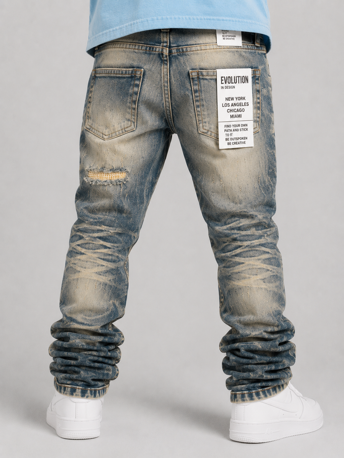 Light wash Evolution Kids Relaxed Straight denim jeans for kids, showing front view with classic five-pocket design and cuffed hems.