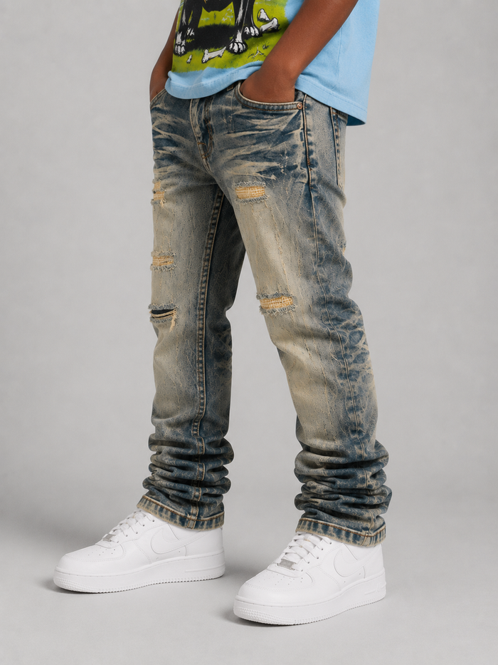 Light wash Evolution Kids relaxed straight denim jeans for kids, showing the fit and classic denim texture.
