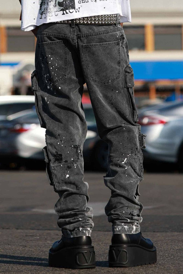 First Row black slim fit cargo denim jeans with stud accents, featuring a modern cargo style and durable denim fabric.