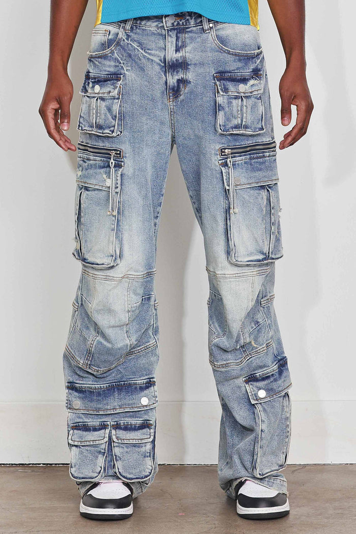 First Row Y2K multi cargo relaxed fit denim jeans in light stone tint with multiple pockets and distressed details.
