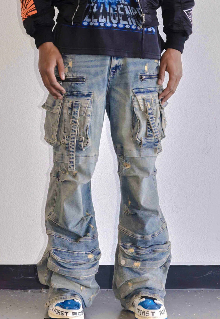 First Row Y2K utility cargo denim jeans in medium stone tint, featuring multiple pockets and a relaxed fit.