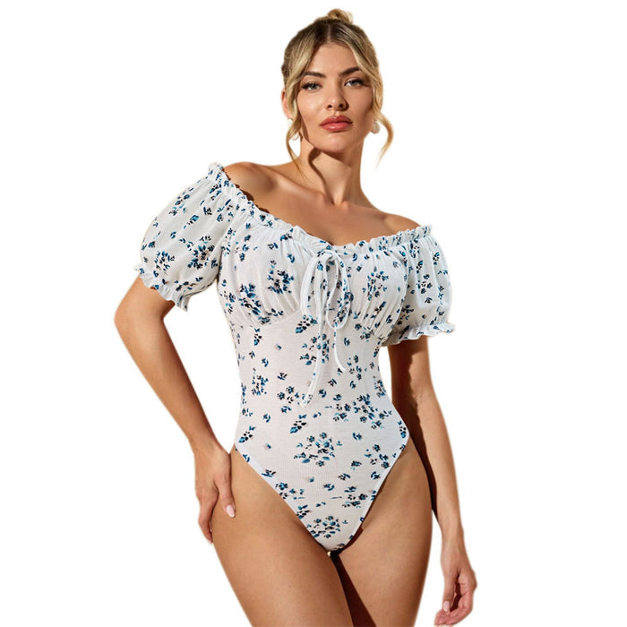 Women's floral jumpsuit product view clearly showing the square neck, puff sleeves and off-shoulder styling in a regular fit.