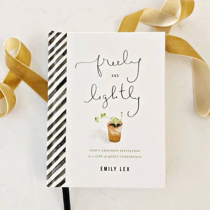 Cover of "Freely and Lightly" by Emily Lex featuring elegant hand-lettered typography, a small watercolor plant illustration, and the subtitle "God's Gracious Invitation to a Life of Quiet Confidence" on a clean white background with a black-and-white striped spine.
