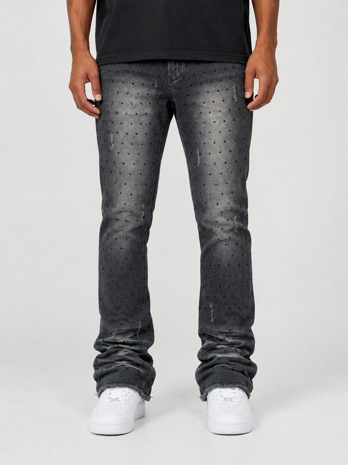Frost Originals Amoto rhinestone stacked black wash denim jeans displayed on a hanger.