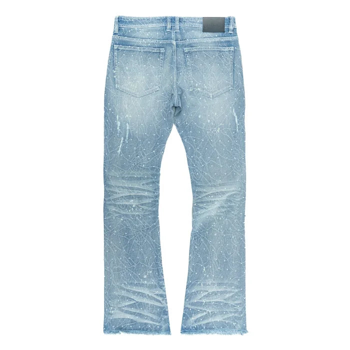 Frost Originals 'Amoto' rhinestone stacked light wash denim jeans with rhinestone embellishments and a relaxed fit.