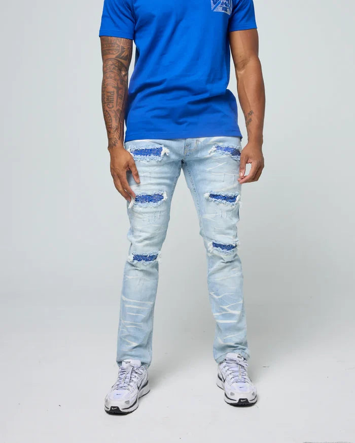 FWRD Crystal denim jeans in ice blue and royal blue, showcasing the stylish fitted design and high-quality denim fabric.