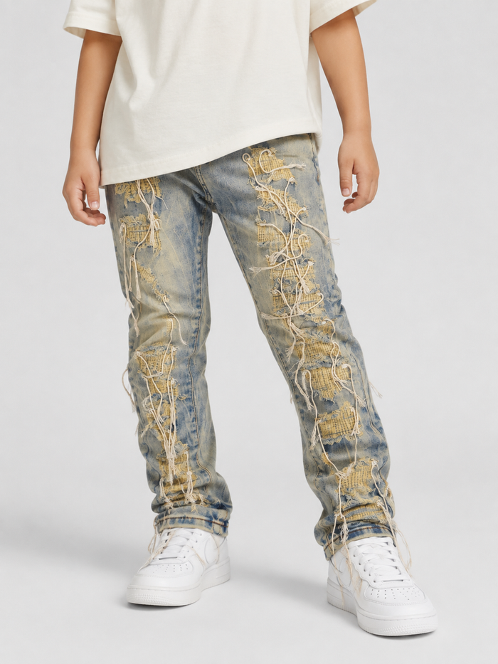 FWRD Kids Annihilator Strings Denim jeans in ice tint, kids denim pants with stylish fit and visible stitching.