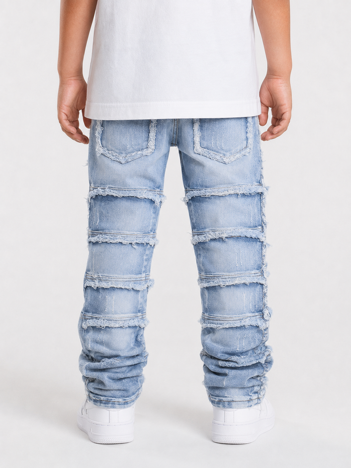 FWRD Kids stacked denim cargo pants in ice blue, stylish and comfortable denim clothing for children.