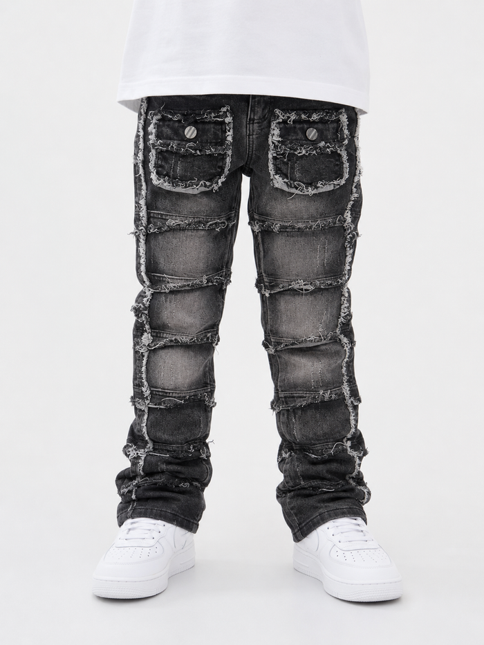 FWRD Kids cargo stacked denim jeans in washed black with a relaxed fit and multiple pockets, stylish for kids.