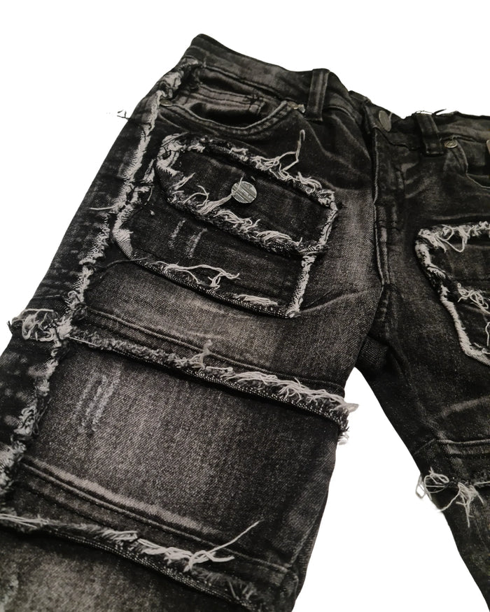 FWRD Kids black washed denim cargo pants with a stacked design, featuring multiple pockets and a relaxed fit.