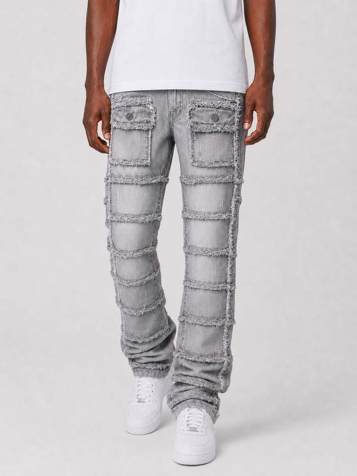 FWRD Patchwork True Stacked Denim in grey, showcasing stylish patchwork design and stacked denim detailing.