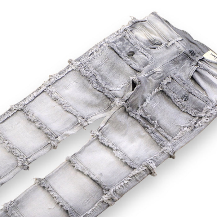 FWRD Patchwork True Stacked Denim jeans in grey with layered patchwork design and distressed detailing.
