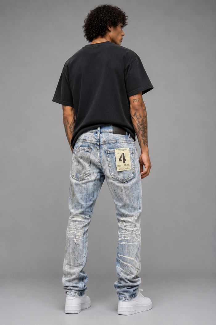 FWRD Washout Relaxed Straight Denim jeans in Ice Blue laid flat showing front view with pockets and distressed details