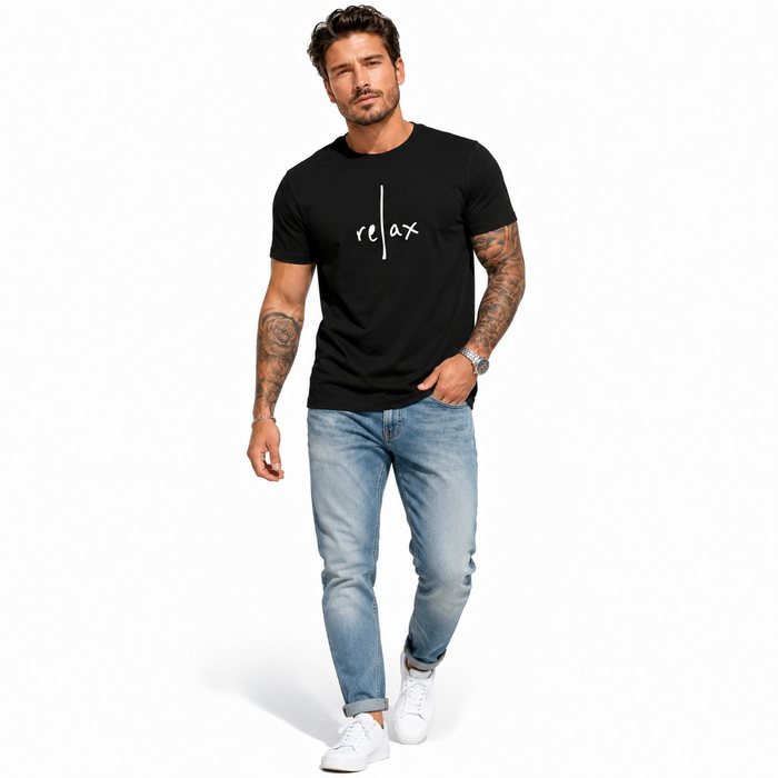 Men’s graphic tee styled with jeans and sneakers on white background