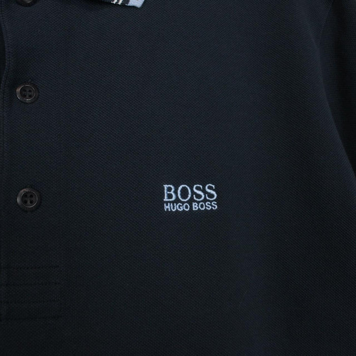 Hugo Boss navy blue short sleeve polo shirt with embroidered logo and cotton material.