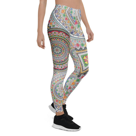 These leggings showcase a vibrant kaleidoscopic explosion of hand-drawn mandala art—massive circular medallions with crimson petals, cerulean geometric fills, and saffron centers (think meticulously filled adult coloring book). Contact us with accessibility feedback, we'd love to help!