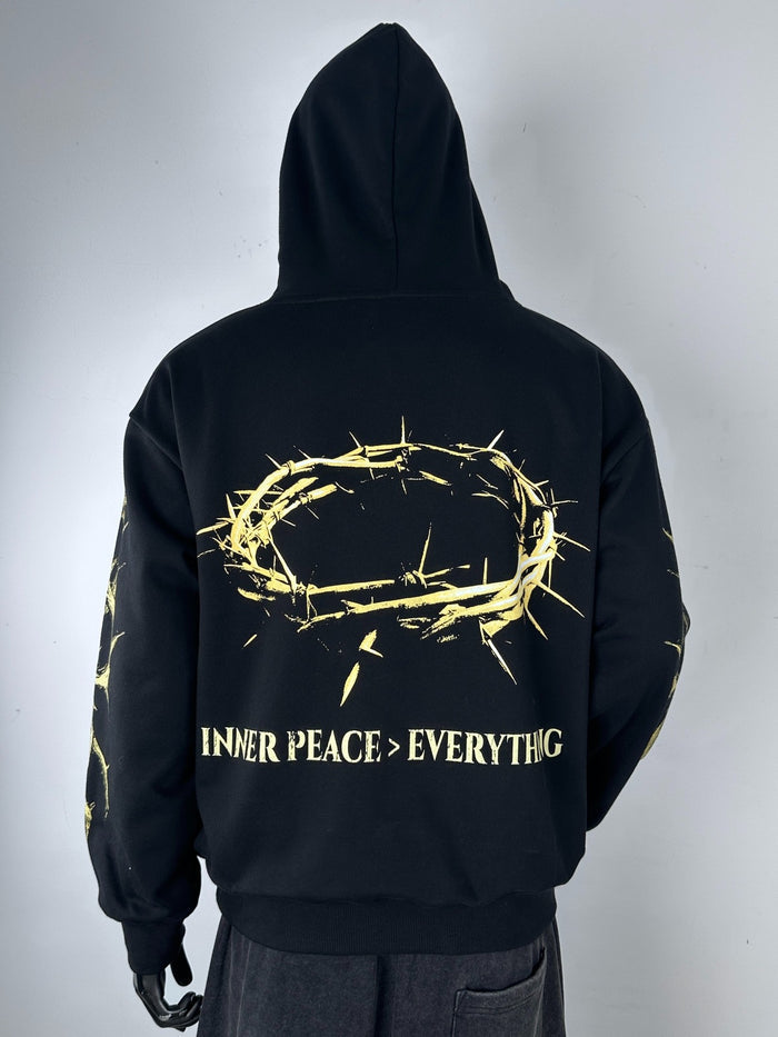 Black Inner Peace ‘IP Over Everything’ hoodie, casual pullover with front logo, made of soft fabric for comfortable wear.