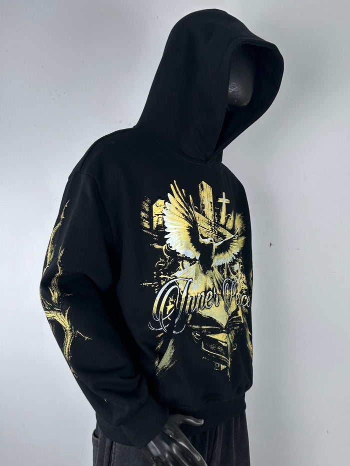 Black Inner Peace 'IP Over Everything' hoodie displayed on a model, showcasing the comfortable pullover design and branding.
