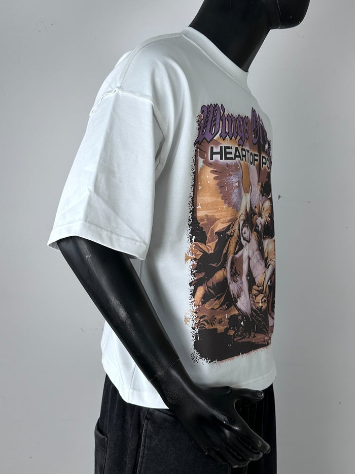 White oversized cropped T-shirt by Inner Peace featuring wings of power design, casual fit, and comfortable fabric.