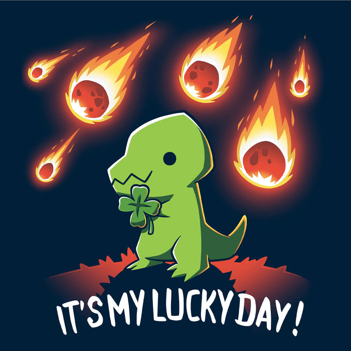 Long Sleeve T-shirt_TeeTurtle navy blue It's My Lucky Day featuring a dinosaur holding a four-leaf clover while meteors fall from the sky. The text below reads, "It's my lucky day!".