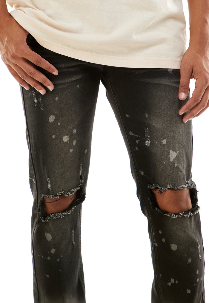 KDNK Ombre Bleached Black Denim jeans with faded black wash and classic denim texture, front view showing fit and style.