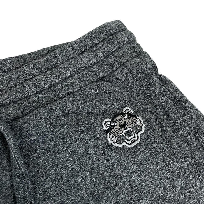 Kenzo grey joggers featuring embroidered tiger logo and soft cotton material.