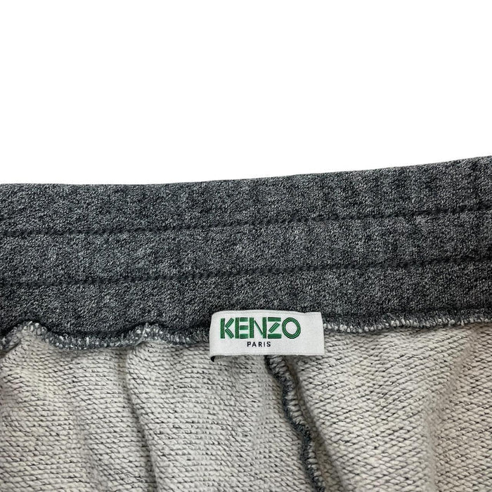 Kenzo grey joggers featuring embroidered tiger logo and soft cotton material.