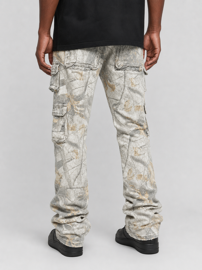 KIND RED Essential Camo stacked denim pants in Snow Fall Camo with a relaxed fit and layered design.