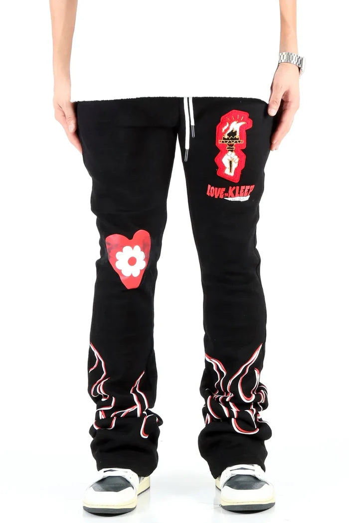 KLEEP Spider heavy weight brushed graphic stacked jogger pants in black with layered design and bold print.