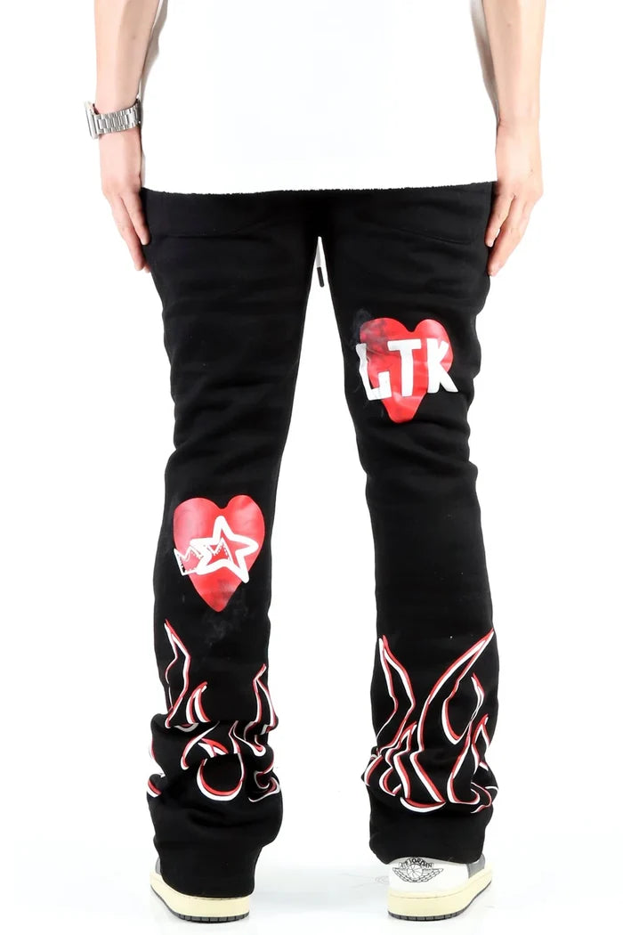 KLEEP Spider heavy weight brushed stacked jogger pants in black with graphic design and tapered fit, casual streetwear style.