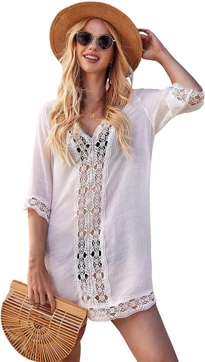 Women’s lace beach tunic dress styled with a woven tote for summer travel