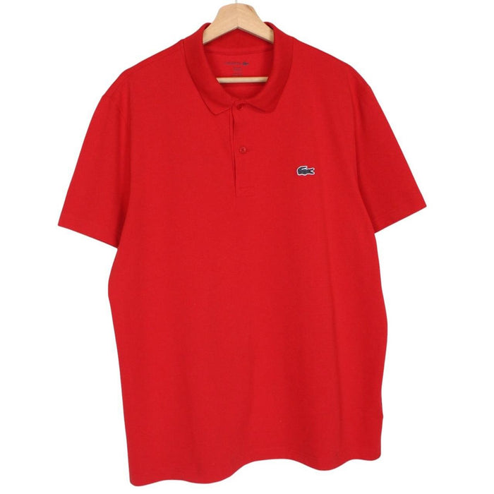 Lacoste red short sleeve polo shirt with embroidered crocodile logo, cotton material.