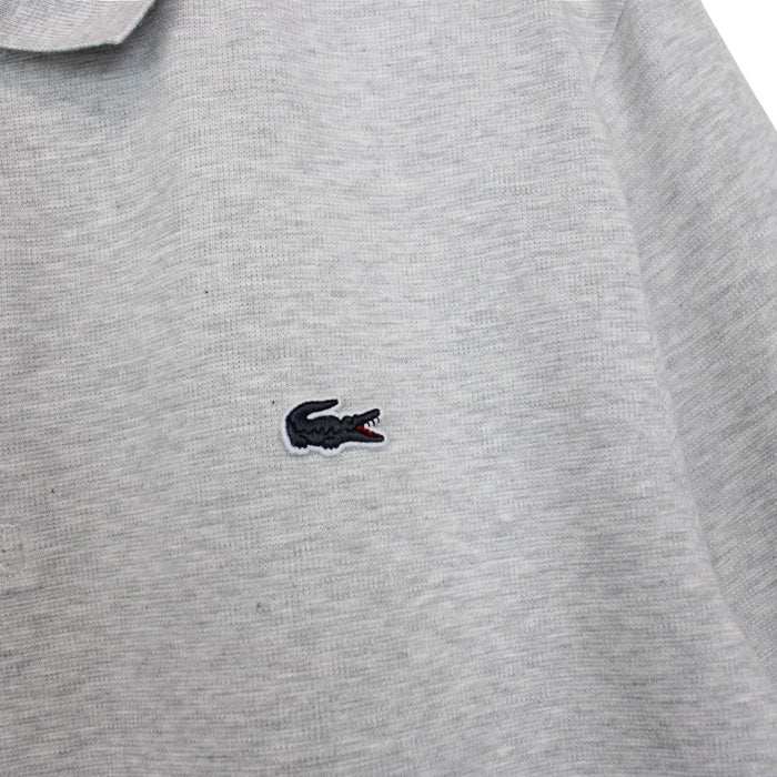 Lacoste grey short sleeve cotton polo shirt with embroidered crocodile logo.