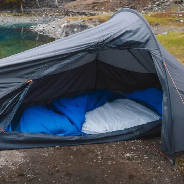 Lifeventure Cotton Sleeping Bag Liner Mummy in grey in use inside a sleeping bag when camping outdoors