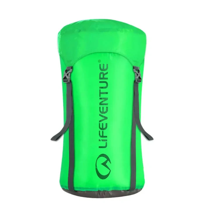 Lifeventure Ultralight Compression Sack 15 Litres in green colour packed but not compressed on a white background