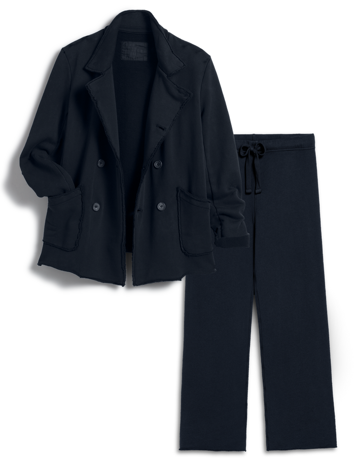 Navy blue jacket and pants on a white background