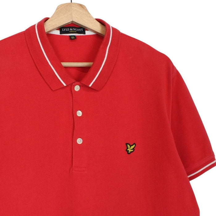 Lyle & Scott red short sleeve polo shirt with embroidered logo and cotton material.