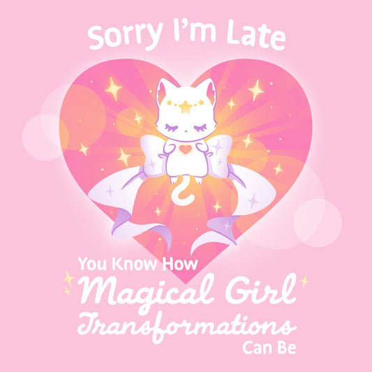Premium Cotton T-shirt_TeeTurtle light pink Magical Girl Transformations apparel featuring a cat floating in a heart with a large bow and sparkles like classic anime girl. Captions says, "Sorry I'm late, you know how magical girl transformations can be".