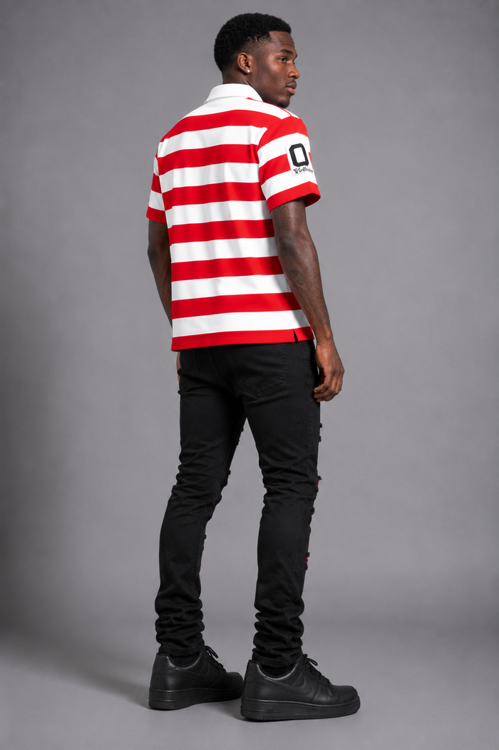 Red MAJESTIK Athletic Team rugby polo shirt with rhinestone patches and athletic team details, casual T-shirt style.