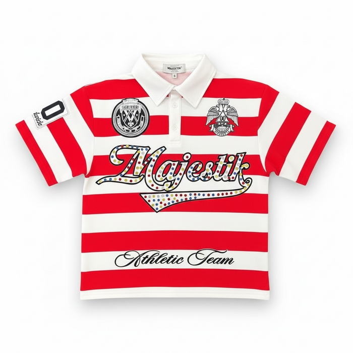 Red Majestik Athletic Team rhinestone rugby patched polo shirt showing embroidered patches and athletic style details.
