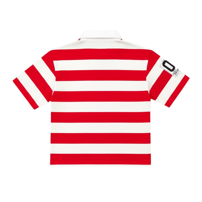 Red Majestik Athletic Team rugby polo shirt with rhinestone patches and athletic branding, displayed on a plain background.