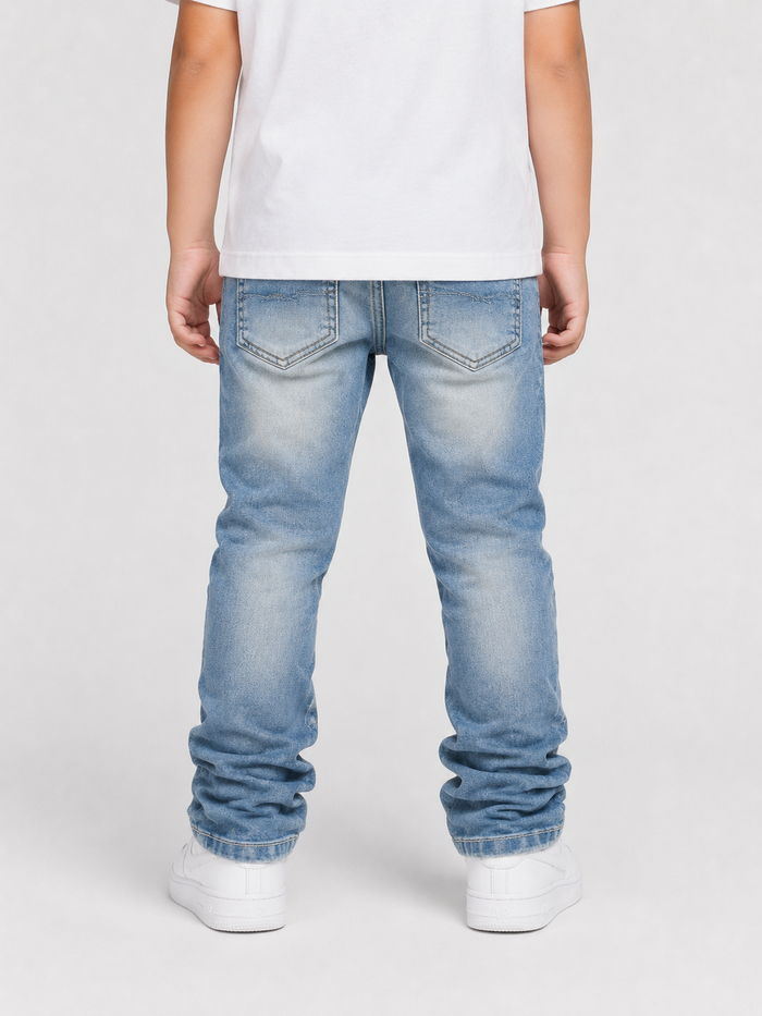 Makobi Kids Montego Jeans stack denim for kids, showing a pair of stylish blue denim kids' jeans with a classic design.