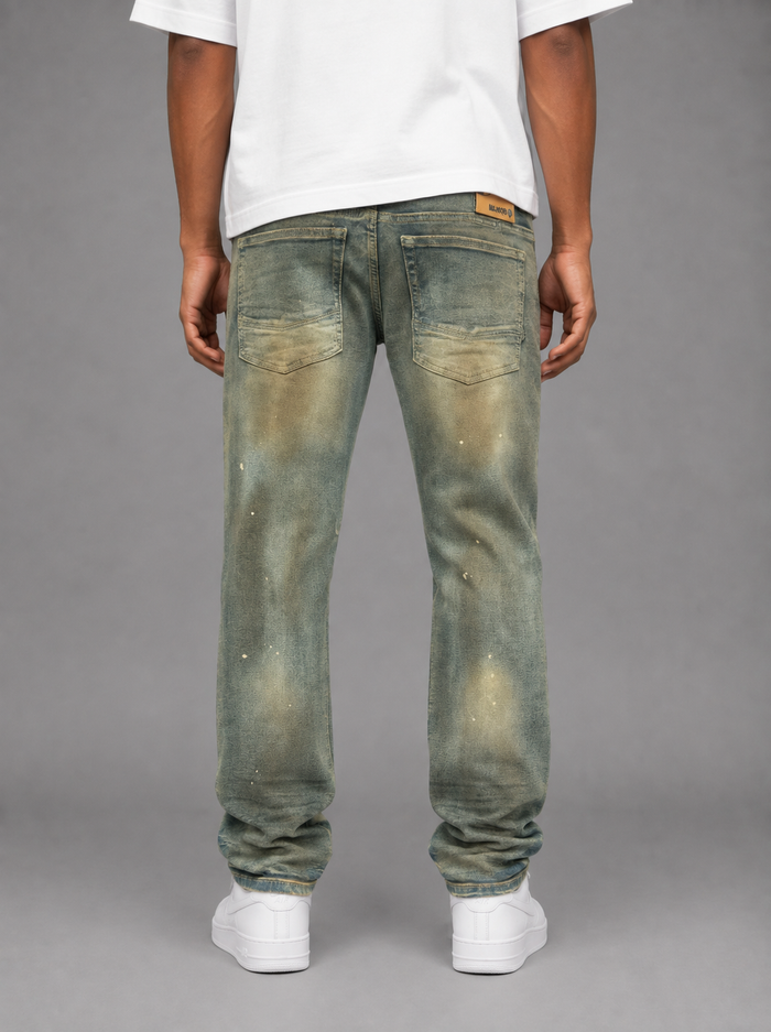 Makobi Lorenzino denim jeans in antique wash, showcasing classic fit and distressed detailing on light blue denim fabric.