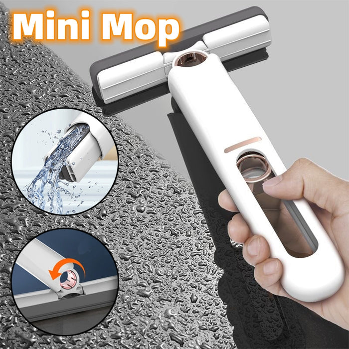 mini squeeze mop stored vertically saving space