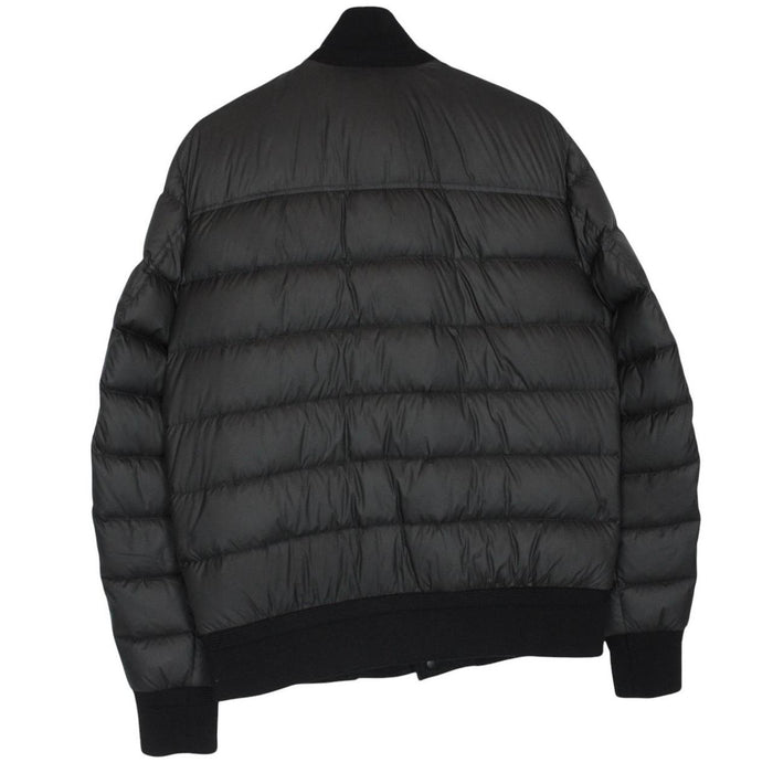 Moncler black suede leather down jacket with full zip and missing badge detail.